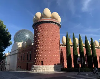 The Theatre-Museum's tower in Figueres, topped with giant egg sculptures